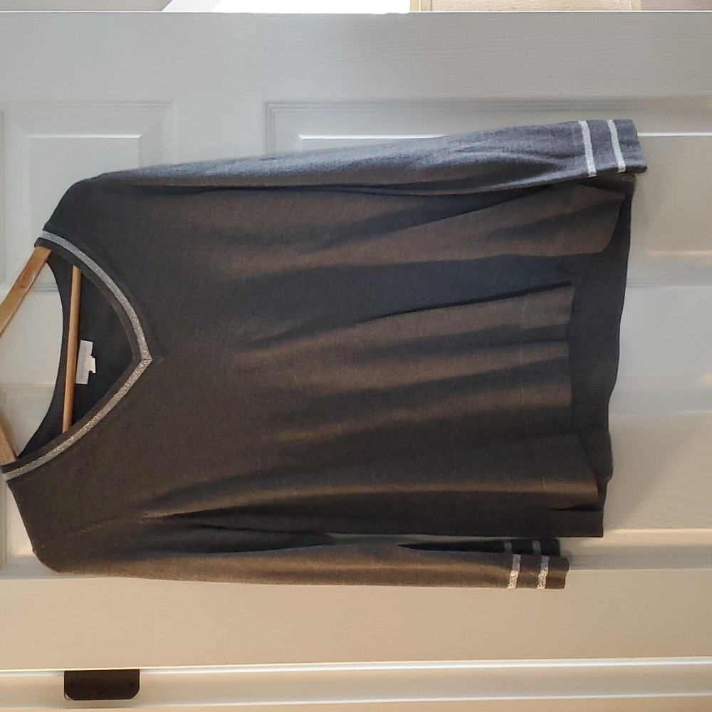 Women sweater Gray was silver metallic accents around neck and sleeves.